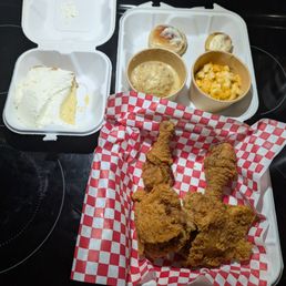 Dark meat chicken plate with dressing with gravy and Mac and cheese with cornbread muffin and a roll. Key lime pie on the side.