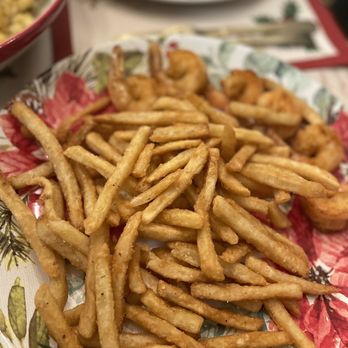 Krab King - seasoned fries and colossal shrimp in the background - Seafood Near Me - Upper Marlboro, Maryland