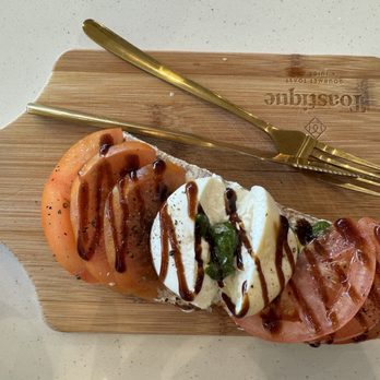 Toastique - Tomato Burrata Toast - Juice Bars & Smoothies Near Me - Colorado Springs, Colorado