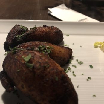 Hemingway's Cuba - Fried Plaintain. Brings out the sweetness and creaminess of the plantain. - Cuban Near Me - Asheville, North Carolina Hemingway's Cuba - Fried Plaintain. Brings out the sweetness and creaminess of the plantain. - Cuban Near Me - Asheville, North Carolina