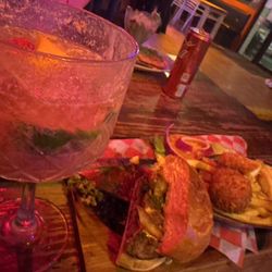 Res Al Fuego - Strawberry and coco mojito. I got the burger with churrasco and chimichuri. The burgers are 2 for $20.  Highly reccomended!!!