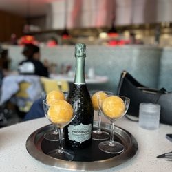 Johnny's - Prosecco with orange  juice sphere