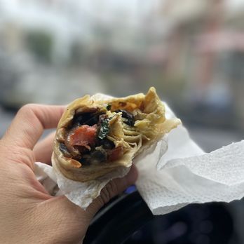 Langhorne Coffee House - a hand holding a burrito - Coffee & Tea Near Me - Langhorne, Pennsylvania Langhorne Coffee House - a hand holding a burrito - Coffee & Tea Near Me - Langhorne, Pennsylvania