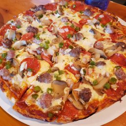 a pizza on a plate a pizza on a plate