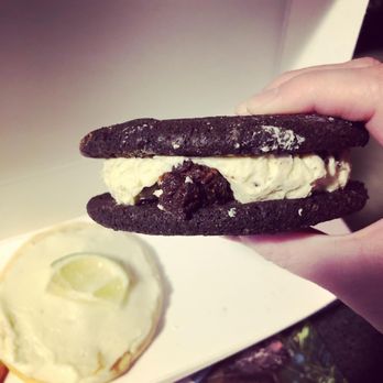 Crumbl - Broken Arrow - Side view of the Mallow Sandwich feat Oreo. This is the best thing I have eaten in awhile. Not super sweet, surprisingly! - Bakeries Near Me - Broken Arrow, Oklahoma