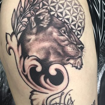 Emerald Tattoo Manteca - Lioness profile with olive leaves and tree of life and His Queen Lettering - Black and Grey Shading by Casey - Tattoo Near Me - Manteca, California Emerald Tattoo Manteca - Lioness profile with olive leaves and tree of life and His Queen Lettering - Black and Grey Shading by Casey - Tattoo Near Me - Manteca, California