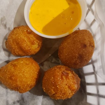 Red Crab House - Laurel - Hush puppies! So yummy! The sauce is a little spicy but adds a different layer of flavor to the hush puppies. - Seafood Near Me - Laurel, Maryland