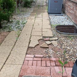Before: uneven, broken pavers