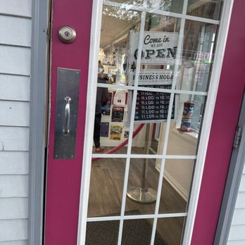 The Cool Spot - Hours of Operation Sign (Partially Hidden) - Ice Cream & Frozen Yogurt Near Me - Frankfort, Michigan