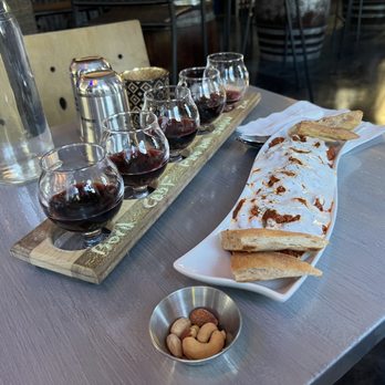 Moods Wine Bar & Bistro - Wine flight, and Aushak appetizer. - Wine Bars Near Me - Sunnyvale, California Moods Wine Bar & Bistro - Wine flight, and Aushak appetizer. - Wine Bars Near Me - Sunnyvale, California