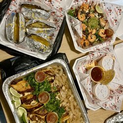 La Vaquerita - 24 pk QuesaBirria with consomé and potatoes, along with Shrimp Asada Fries