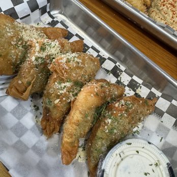 Simply Greek - Spanakopita (5) appetizer with a side of their delicious tzatziki. - Greek Near Me - Cypress, Texas Simply Greek - Spanakopita (5) appetizer with a side of their delicious tzatziki. - Greek Near Me - Cypress, Texas