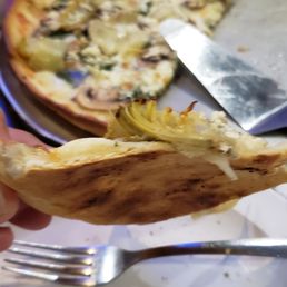 thin crust pizza, wasn't floppy. thin crust pizza, wasn't floppy.