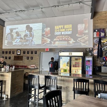 Vallensons' Brewing Company -  bar with a projector screen - Breweries Near Me - Pearland, Texas