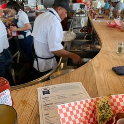 Captain Benny's Seafood - He is the rude bartender.