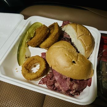 Parkway Deli & Restaurant - Pastrami & Corned beef on a Kaiser roll, onion rings, and pickle. - Delis Near Me - Silver Spring, Maryland