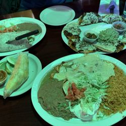 Chicken Enchiladas Verdes, steak nachos, steak burrito and taco al pastor. Steak too salty, chicken too watery and al pastor was meh.