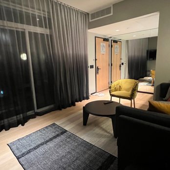 The Shay Hotel - Room 542 suite sitting area, balcony behind sliding doors - Hotels Near Me - Culver City, California The Shay Hotel - Room 542 suite sitting area, balcony behind sliding doors - Hotels Near Me - Culver City, California
