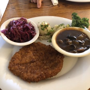Der Lindenbaum - Schnitzel w/mushroom sauce, potato salad, and red cabbage. - German Near Me - Fredericksburg, Texas