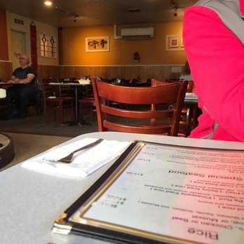 Thai Carrot - Menu, my wife's arm, some guy, dining area - Thai Near Me - Aberdeen, Washington