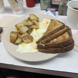 2 sunny side up eggs fresh potatoes and rye bread. Perfect food after a long night!!
