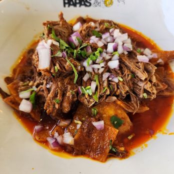 Papas and Eggs - Red Chilaquiles with birria. Good presentation. A bit high in price for portion size. - Breakfast & Brunch Near Me - San Jose, California Papas and Eggs - Red Chilaquiles with birria. Good presentation. A bit high in price for portion size. - Breakfast & Brunch Near Me - San Jose, California