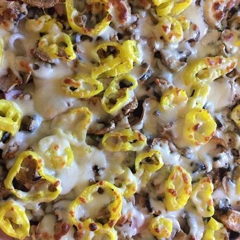 Finish Line Pizza - the toppings on the pizza - Pizza Near Me - Vassar, Michigan