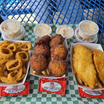 Emerald City Fish & Chips - Calimari rings, fries, crab puppies and fried cod - Fish & Chips Near Me - Seattle, Washington Emerald City Fish & Chips - Calimari rings, fries, crab puppies and fried cod - Fish & Chips Near Me - Seattle, Washington