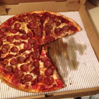 Montell's Pizza - a half eaten pepperoni pizza - Pizza Near Me - Somerset, Ohio Montell's Pizza - a half eaten pepperoni pizza - Pizza Near Me - Somerset, Ohio