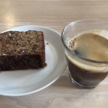 Vergennes Laundry - Chocolate coconut banana bread and Americano coffee. - Specialty Food Near Me - Vergennes, Vermont Vergennes Laundry - Chocolate coconut banana bread and Americano coffee. - Specialty Food Near Me - Vergennes, Vermont