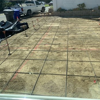 Custom Decorative Landscape - Back parking area after putting down rebar - Landscape Architects or Designers Near Me