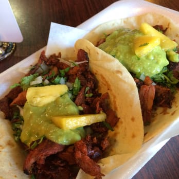 Taco Bar - Pastor tacos come with pineapple on top so good! These are on flour! - Mexican Near Me - San Marcos, California Taco Bar - Pastor tacos come with pineapple on top so good! These are on flour! - Mexican Near Me - San Marcos, California
