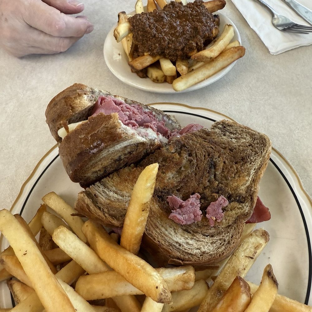 The Ruben sandwich with Greek fries in the background. The Ruben sandwich with Greek fries in the background.