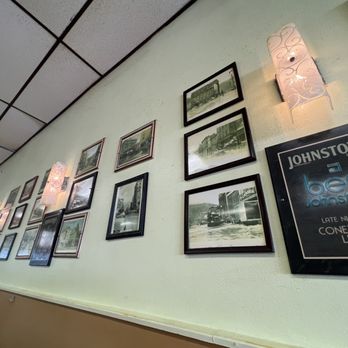 Coney Island Lunch - a wall of framed photographs - Hot Dogs Near Me - Johnstown, Pennsylvania