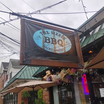 The Sizzle BBQ - The front sign at The Sizzle BBQ's Hackettstown location. - Barbeque Near Me - Hackettstown, New Jersey The Sizzle BBQ - The front sign at The Sizzle BBQ's Hackettstown location. - Barbeque Near Me - Hackettstown, New Jersey