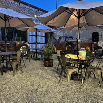The Whistlestop - a patio with tables and umbrellas - Restaurants Near Me - Trinidad, Texas The Whistlestop - a patio with tables and umbrellas - Restaurants Near Me - Trinidad, Texas