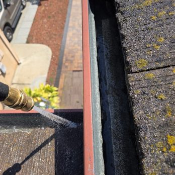 Squeegee Pros - Flushing of gutter after all debris removed. - Window Washing Near Me - San Jose, California