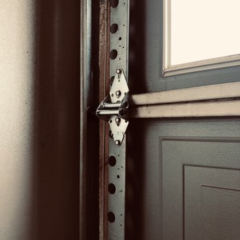 Garage Doors By Jeff - Shiny new hinge to seal-the-deal and solve my problem - Garage Door Services Near Me