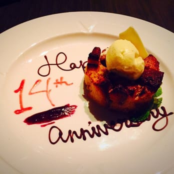 Mezzaluna - White Chocolate Bread Pudding with sweet message for our anniversary. - New American Near Me - Fargo, North Dakota