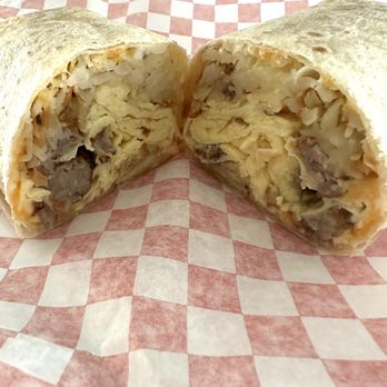 Shorty'z - Sausage breakfast burrito filled w/egg, potatoes, cheese and sausage. - Breakfast & Brunch Near Me - Fullerton, California Shorty'z - Sausage breakfast burrito filled w/egg, potatoes, cheese and sausage. - Breakfast & Brunch Near Me - Fullerton, California