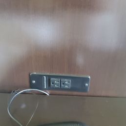 No USB charger (I even checked the alarm) so bring your plug charger. 2 by each bed and some in bathroom. No USB charger (I even checked the alarm) so bring your plug charger. 2 by each bed and some in bathroom.