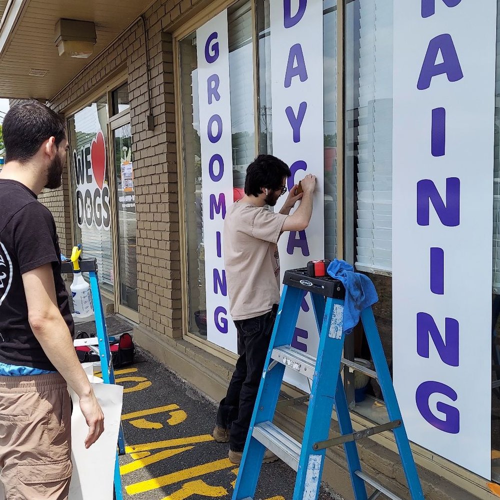 Fastsigns - Setting up new signage for Dog Groomer shop - Signmaking Near Me - Saddle River, New Jersey
