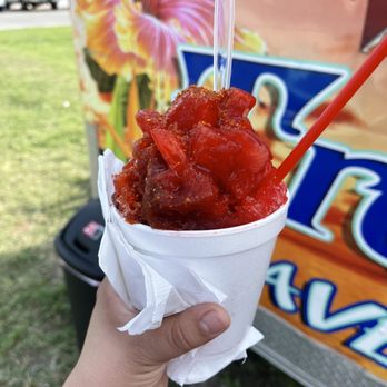 Tropical Palms Shave Ice - a hand holding a cup of ice cream - Shaved Ice Near Me - Austin, Texas Tropical Palms Shave Ice - a hand holding a cup of ice cream - Shaved Ice Near Me - Austin, Texas