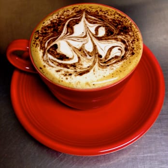 Coffeegarden - a cappuccino on a red saucer - Coffee & Tea Near Me - Eugene, Oregon
