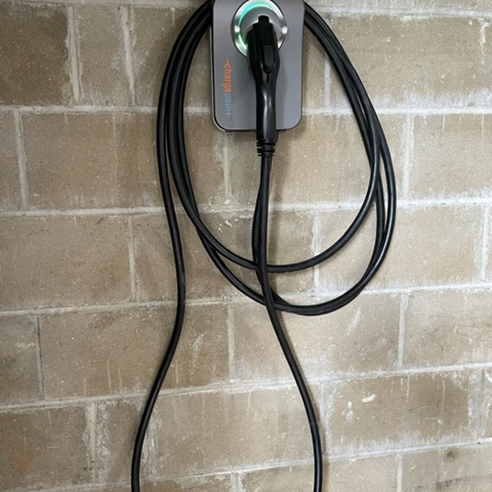 EV Charger mounted in the garage EV Charger mounted in the garage
