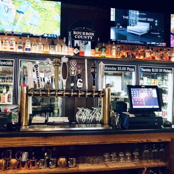 Cleveland Pub & Grill - a bar with a lot of liquor - New American Near Me - New Berlin, Wisconsin