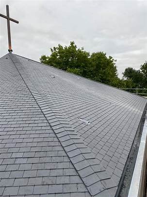 Slide of TH Roofing and Construction