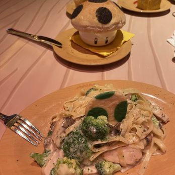 Toadstool Cafe - Yoshi Fettuccine Alfredo $16.99 & Super Mushroom Pizza Bowl $17.99 - Burgers Near Me - Orlando, Florida