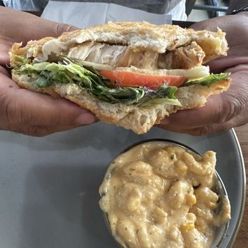 Roostr Yard - Classic chicken sandwich, but he had already smushed it - Salad Near Me - Oceanside, California