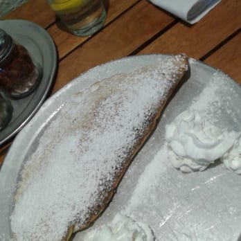 Apizza Brooklyn Resto + Vino - The Real Deal. Imagine nutella and canoli cream in a large calzone shape topped with powder sugar. - Pizza Near Me - Pinecrest, Florida Apizza Brooklyn Resto + Vino - The Real Deal. Imagine nutella and canoli cream in a large calzone shape topped with powder sugar. - Pizza Near Me - Pinecrest, Florida
